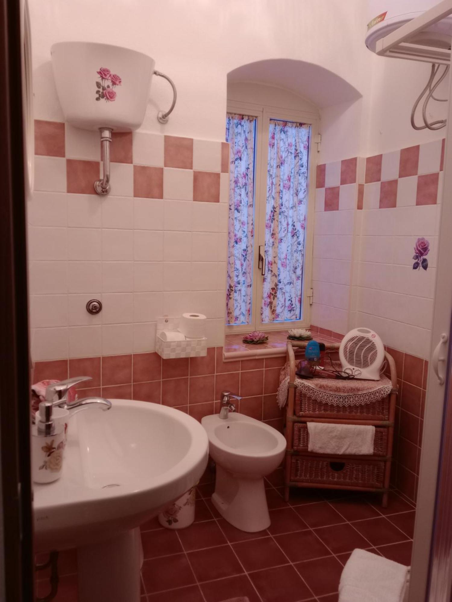 Appartamento Vacanze Le Rose Боса Экстерьер фото